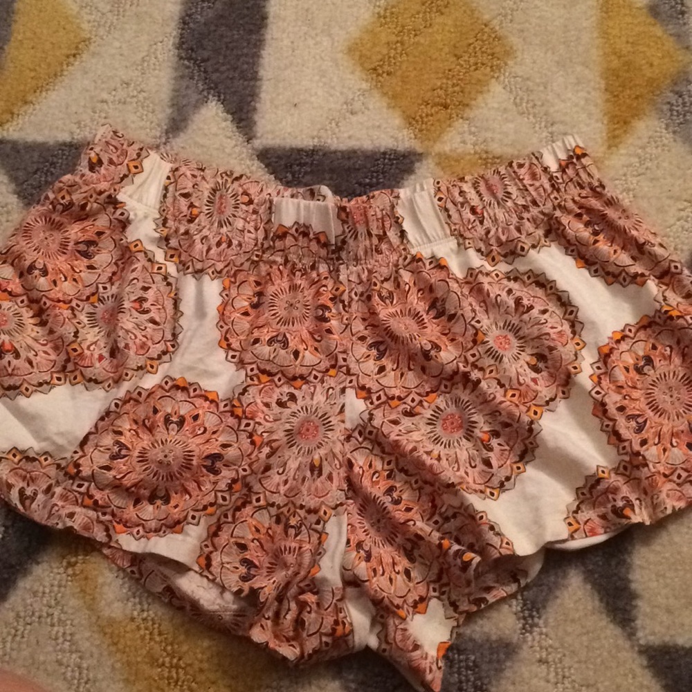 Orange and white fabric shorts